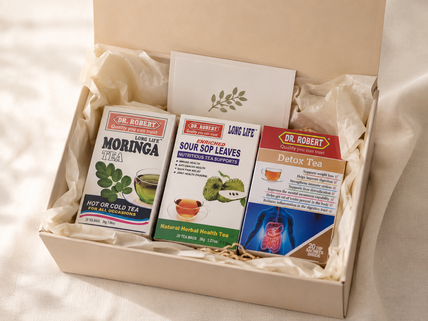 Alma Tea Discovery Trio gift box with Dr. Robert moringa, soursop leaves and detox herbal teas.